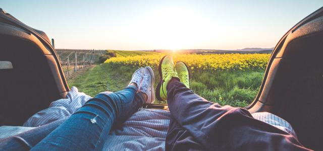 young-couple-enjoying-romantic-sunset-from-car-trunk-picjumbo-com